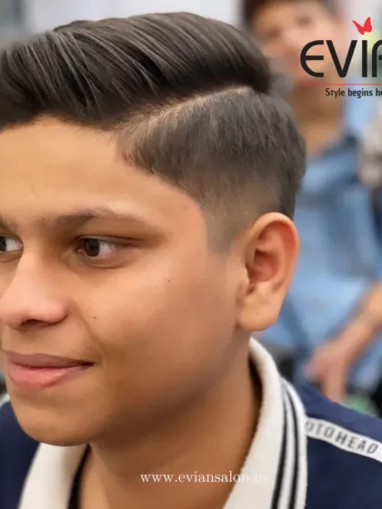 The final result is a sharp, clean side-part haircut with a neat fade. It's a stylish and age-appropriate look that he is clearly happy with.