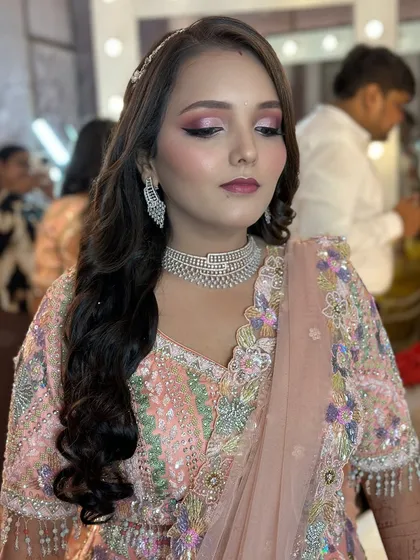 A close-up of the Indo-western look, showing the beautiful color combination and flawless application.