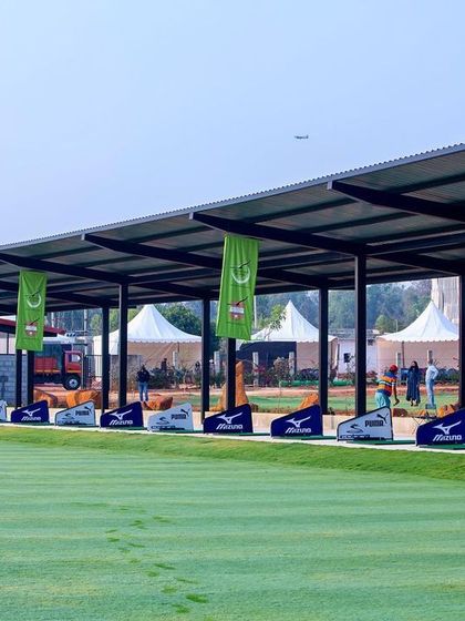 A closer look at our professional driving range bays. We partner with leading brands to provide a top-tier practice environment, ensuring every session is productive.