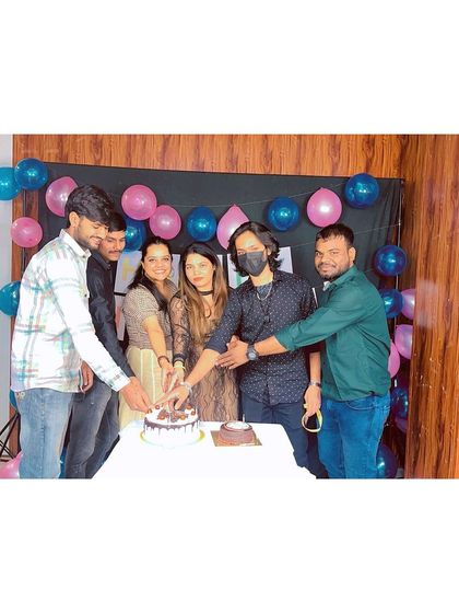 Every celebration includes a cake! Our students and staff cutting a cake together during our academy festivities.