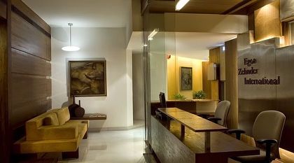 Another view of the Egon Zehnder reception, showing the clean lines and warm material palette that defined the space.