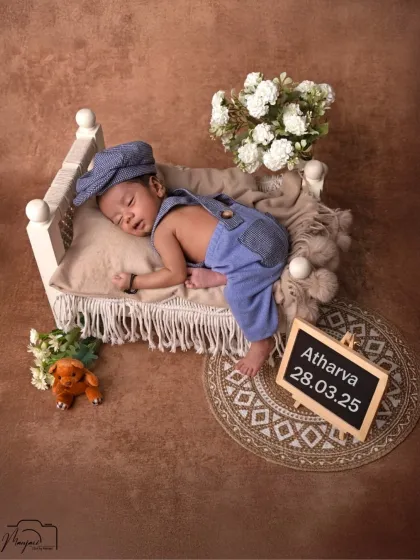 A sweet announcement shot, with a slate board sharing the baby's name and birthdate. A perfect keepsake.