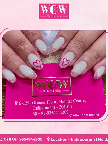 A cute and romantic design featuring a soft, glittery white base with delicate pink hearts. These oval-shaped extensions are perfect for Valentine's Day or any day you want to feel the love.