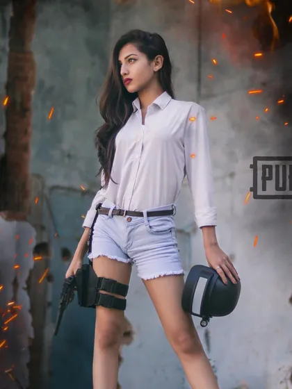 "Enemies ahead." This shot from the PUBG series captures a moment of alertness. The model stands ready with her gear, and the edited-in sparks and smoke add to the dramatic, game-like environment.