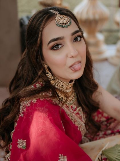 A fun and playful shot of the bride. I encourage creating a comfortable and enjoyable experience for clients, which I also cover in my training.