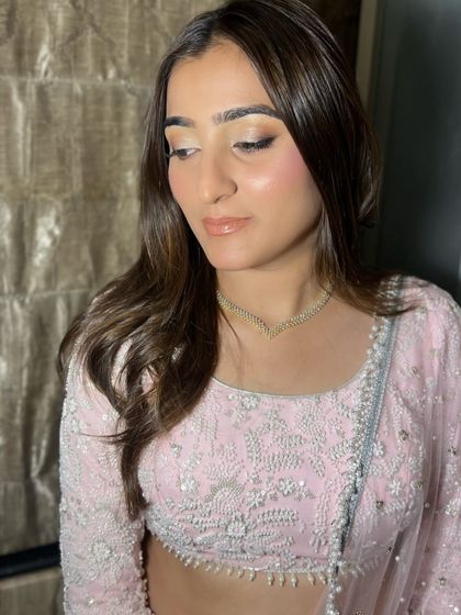 Proving that less is more, this is a dreamy, minimal makeup look perfect for a pre-wedding event. We focused on glowing skin and soft, shimmering eyes.