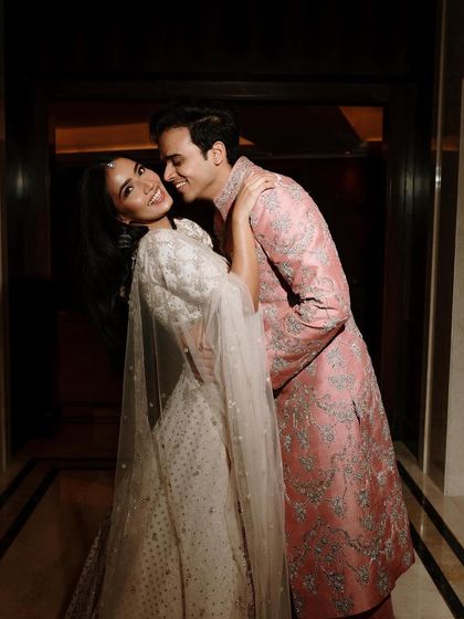 A playful and joyous moment captured. The bride's natural and glowing makeup lets her personality shine.