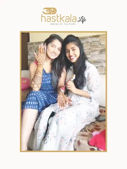 A candid moment with a client, discussing her design. Every mehendi session is a collaboration.