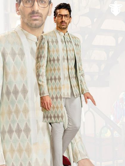 This Indo-Western sherwani features a unique diamond-patterned fabric in muted earth tones. The asymmetrical cut adds a modern touch to this sophisticated ensemble.