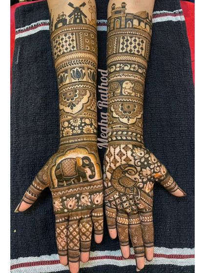 This design tells a story of a journey, with a windmill on one arm and a palace on the other. The palms feature a large elephant and a peacock, blending different symbolic elements.