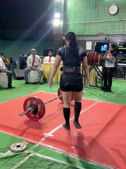 Siddhi competing at her first Open Nationals while managing a family health crisis. Despite sleepless nights and disrupted training, her strong-headed character shone through as she hit a 140kg squat and placed 7th in India.