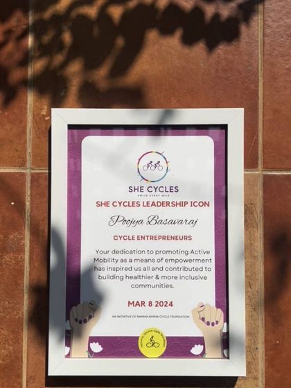 A close-up of the 'She Cycles Leadership Icon' award. It acknowledges our work in building a healthier and more inclusive community through cycling.