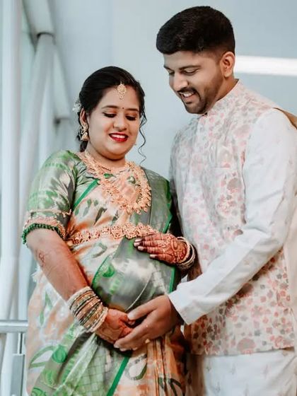 A sweet moment where the parents-to-be connect over the baby bump. Even during a busy event, I look for these quiet, meaningful interactions.