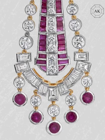 A detailed close-up of the cascading ruby and diamond earrings, showing the precision in every setting.