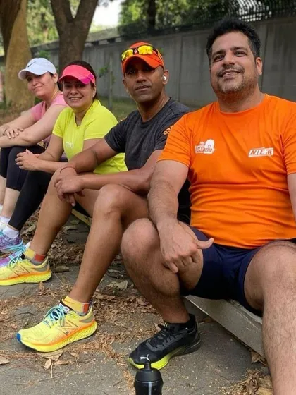 Relaxing on a bench after a satisfying run. These moments of rest and conversation are just as important as the run itself.