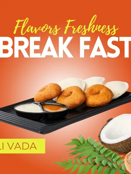 The quintessential South Indian breakfast combination of soft, steamed Idli and crispy, savory Vada. This dish is served with our signature chutneys and sambar for a complete and wholesome meal.