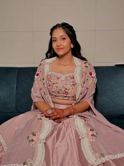 The full Roka look, showing the elegant co-ord set with a jacket. The hairstyle is kept simple to balance the detailed embroidery.