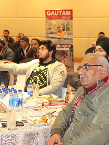 Attendees at our Jammu tech workshop listening intently to a presentation on our robotic layup and other automated manufacturing processes.