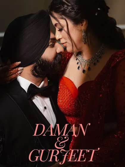 A classic, romantic portrait of a Sikh couple at their reception. The dramatic lighting and their close embrace create a powerful and elegant fine-art photograph.