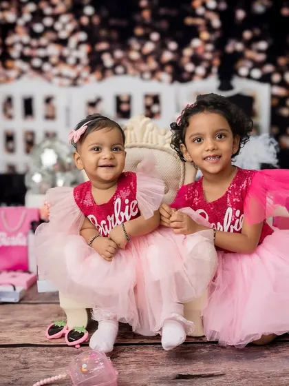 Built-in besties! This Barbie-themed sibling photoshoot was all about capturing the special bond between sisters. I love creating a fun, imaginative world where their personalities can shine together.