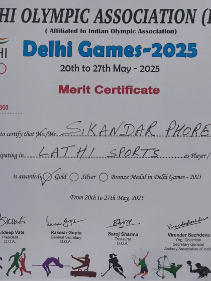 Talk is cheap. This is my Gold Medal in Lathi Sports from the Delhi Games. I don't just teach, I have competed and won at the highest level.