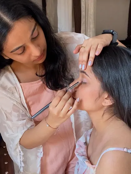 A behind the scenes moment of me at work. I believe the process should be as enjoyable as the result. I bring a calm and focused approach to ensure my clients feel relaxed and confident while I create their perfect look.