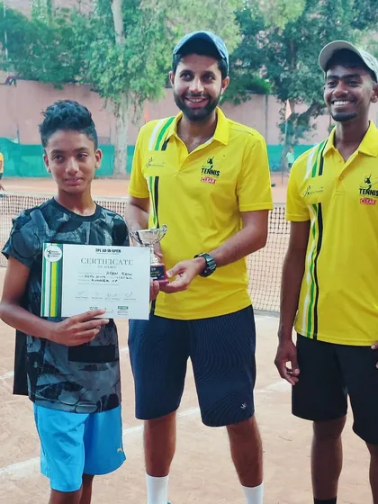 Champions! A coach celebrating a win with his student at a TPL event.
