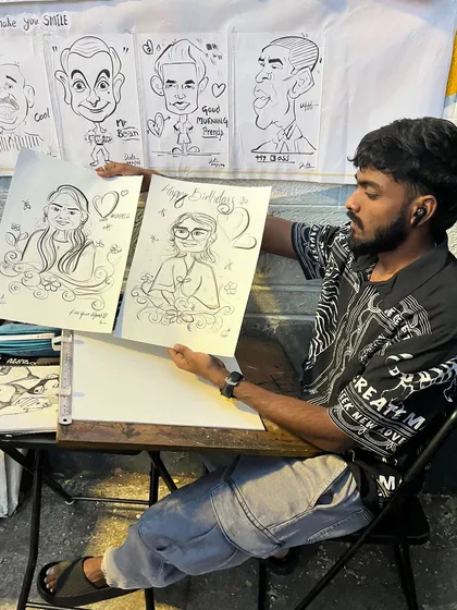 Here I am in my element. Whether I'm at a pop-up market or working on a custom order, I'm always focused on creating art that makes you happy.