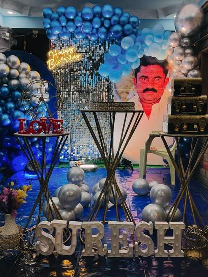 A final wide shot of the complete birthday setup, showcasing the interplay of balloons, lighting, and personalized elements that make the event unique.