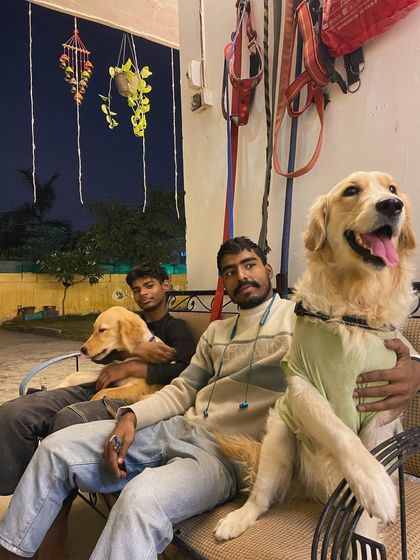 A happy dog and a happy staff member. It's a joy to spend our days with these wonderful animals.