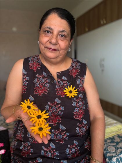 A closer look at my handmade crochet sunflower brooches. These bright yellow flowers can instantly freshen up any outfit.
