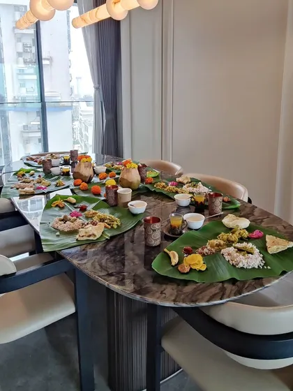 A beautiful Onam Sadhya setup at a client's home. I can recreate this traditional feast for your family gatherings, complete with banana leaf plates and a full spread of vegetarian dishes.