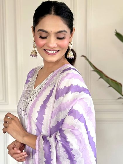 A simple yet chic white rayon kurta with a lovely purple floral print. This is my go-to for an easy, comfortable, and stylish everyday look.
