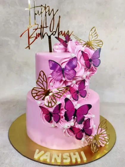I am obsessed with how this two-tiered pink butterfly cake turned out. It’s perfect for a sweet sixteen or any milestone birthday, combining elegant design with a touch of whimsy.