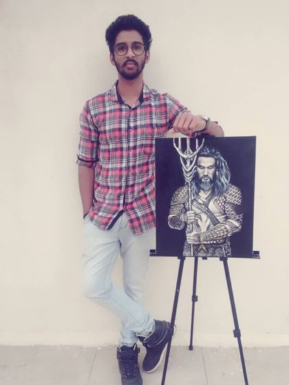 Here I am with my finished Aquaman canvas painting. Creating art of my favorite heroes is a great way to combine my passion for painting and pop culture.