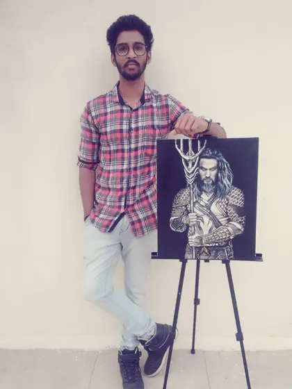 Here I am with my finished Aquaman canvas painting. Creating art of my favorite heroes is a great way to combine my passion for painting and pop culture.
