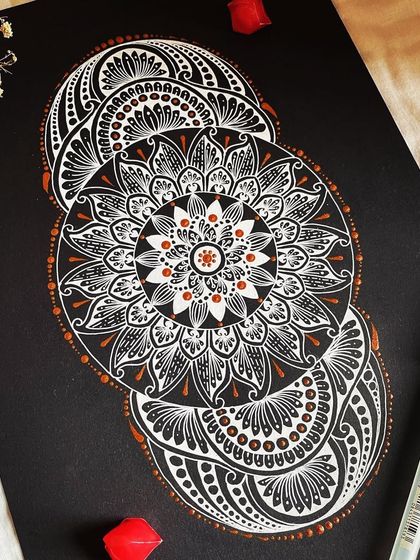 Another view of this triple-mandala design. The touch of bronze adds a beautiful metallic shimmer against the white ink.