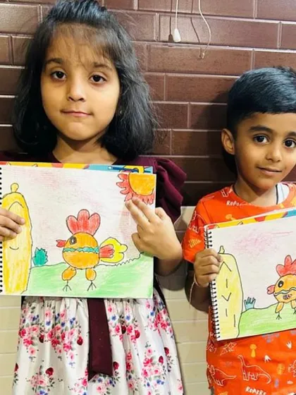 Look at the fantastic chickens these two young artists have drawn. Our classes make drawing animals easy and fun, starting with simple shapes that build into a full character.