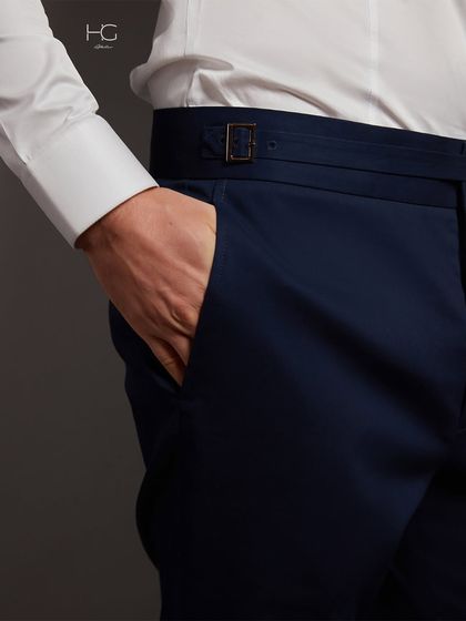 A close-up on the side-adjuster of my tailored trousers. This is a hallmark of bespoke tailoring, allowing for a perfect fit without the need for a belt.