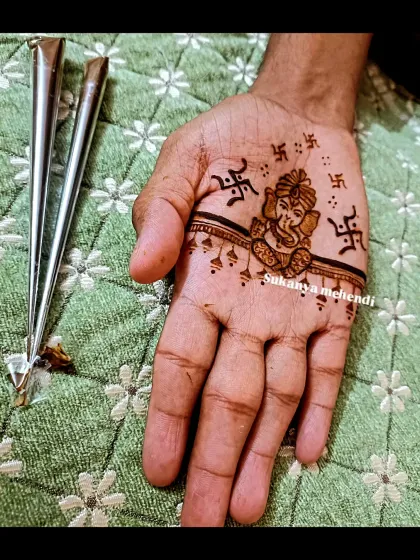 Mehendi is for everyone celebrating a special occasion. Here is a simple yet significant Ganesha motif for a groom, bringing blessings to his new beginning.