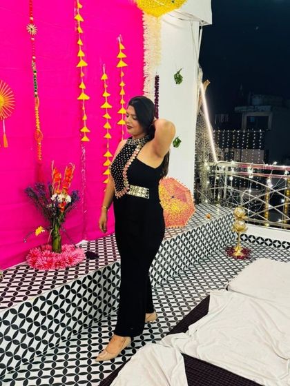 A side profile of the jumpsuit, highlighting the stylish cut and fit.