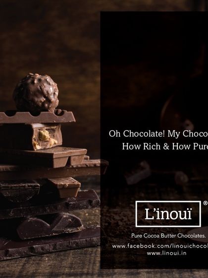 Oh Chocolate! My Chocolate! How rich and how pure. A stack of our different chocolate bars, topped with a truffle, celebrating the comforting and pure experience of real chocolate.