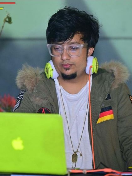 Here I am focused on my Traktor controller and laptop at Bangalore Brew Works. Whether it's hip-hop or commercial hits, the right track selection is everything.