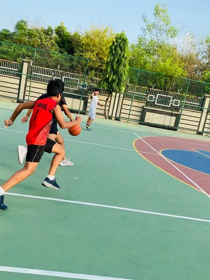 A player drives to the basket during a morning drill.