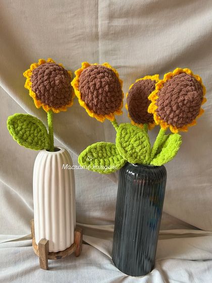 Our chunky yarn crochet sunflowers styled in modern black and white vases. Their bold texture and cheerful look can brighten any room.