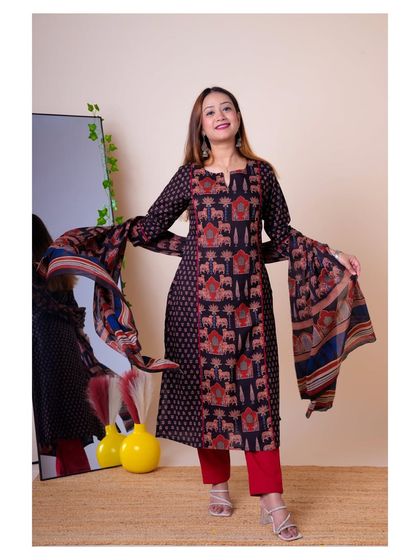 This shot showcases the kurta with a matching dupatta, displaying the full three-piece set for customers.