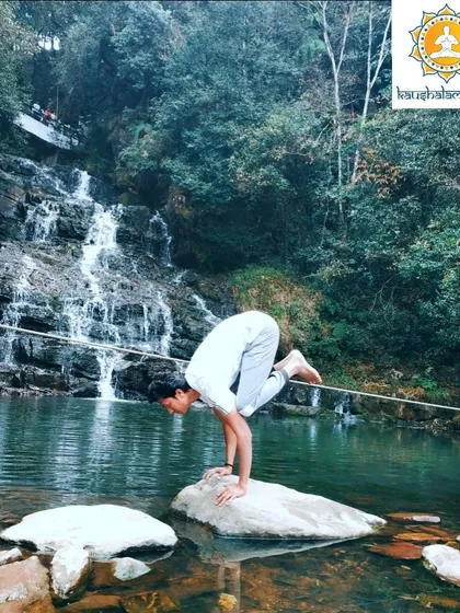 Here I perform Bakasana, the Crane Pose, on a rock amidst a flowing waterfall. This arm-balancing asana builds significant upper body strength and concentration, teaching us to find stillness and stability even when surrounded by the constant motion of life.