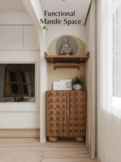 A functional mandir space doesn't have to be large. We designed this peaceful corner with a simple shelf and a beautiful carved cabinet below, integrating it seamlessly into the living area.