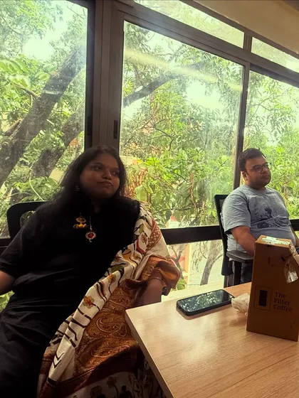 Participants listening intently during a character development session. The beautiful green view outside our window provides a calm backdrop for our deep and often intense discussions.