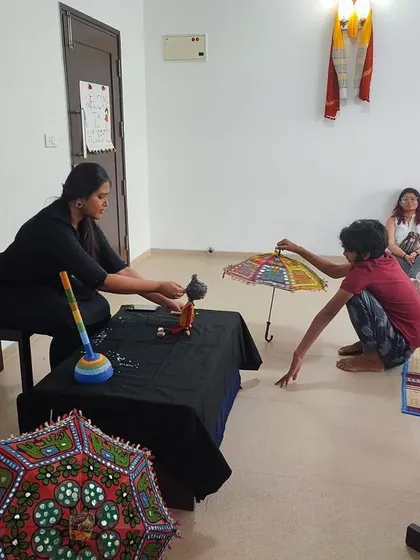An interactive moment where a participant helps with the performance. Our shows are designed to be a two-way street, inviting the audience to become part of the story.